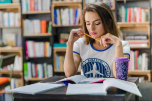 student-concentrating-on-ielts-preparation-course-study